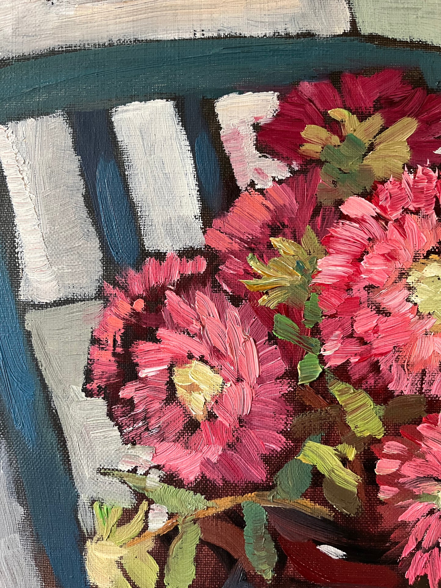 Red flowers and blue chair