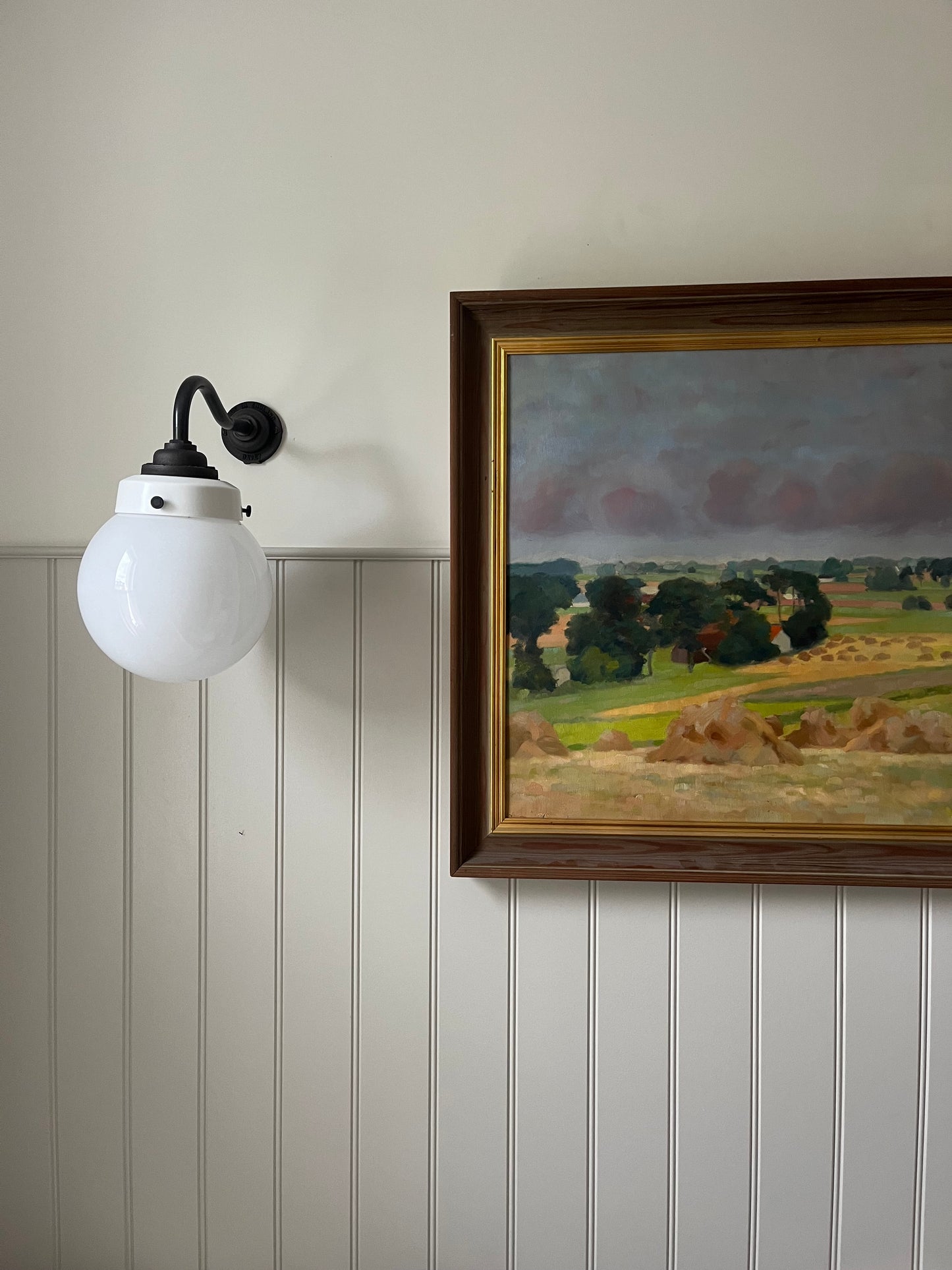 Hay bales and green trees