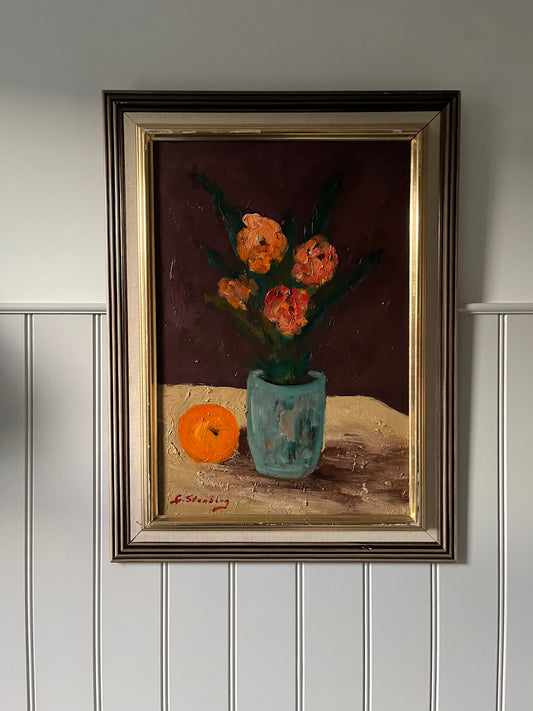 Pink flowers and an orange