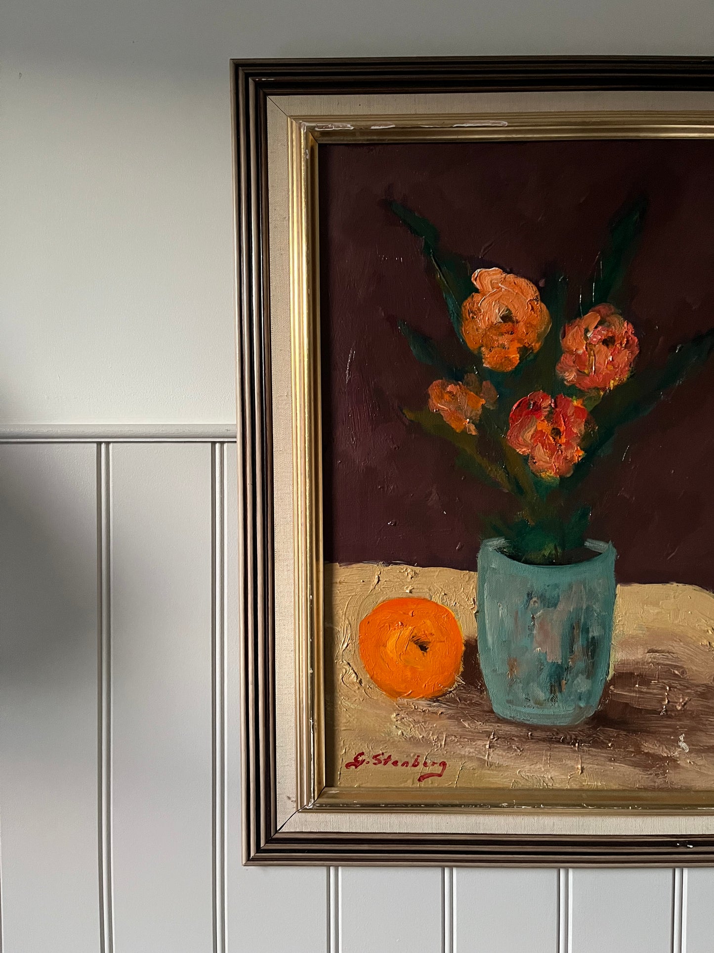 Pink flowers and an orange