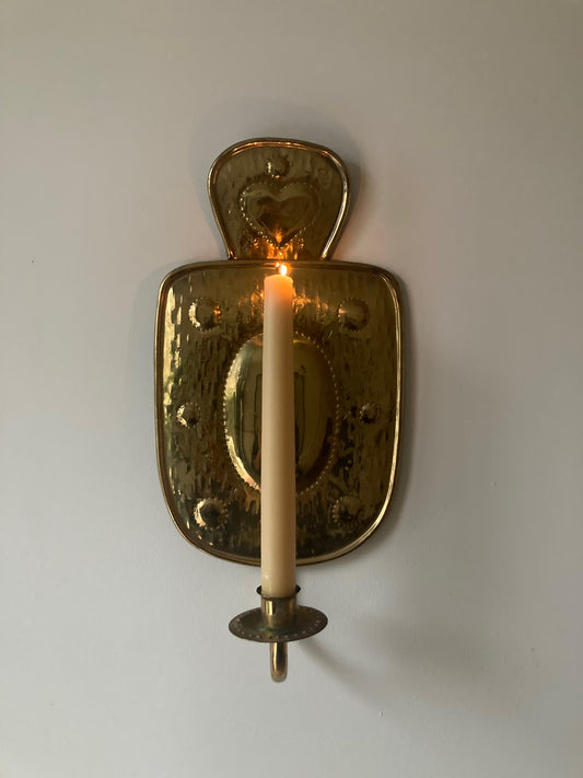 A single Swedish heart sconce