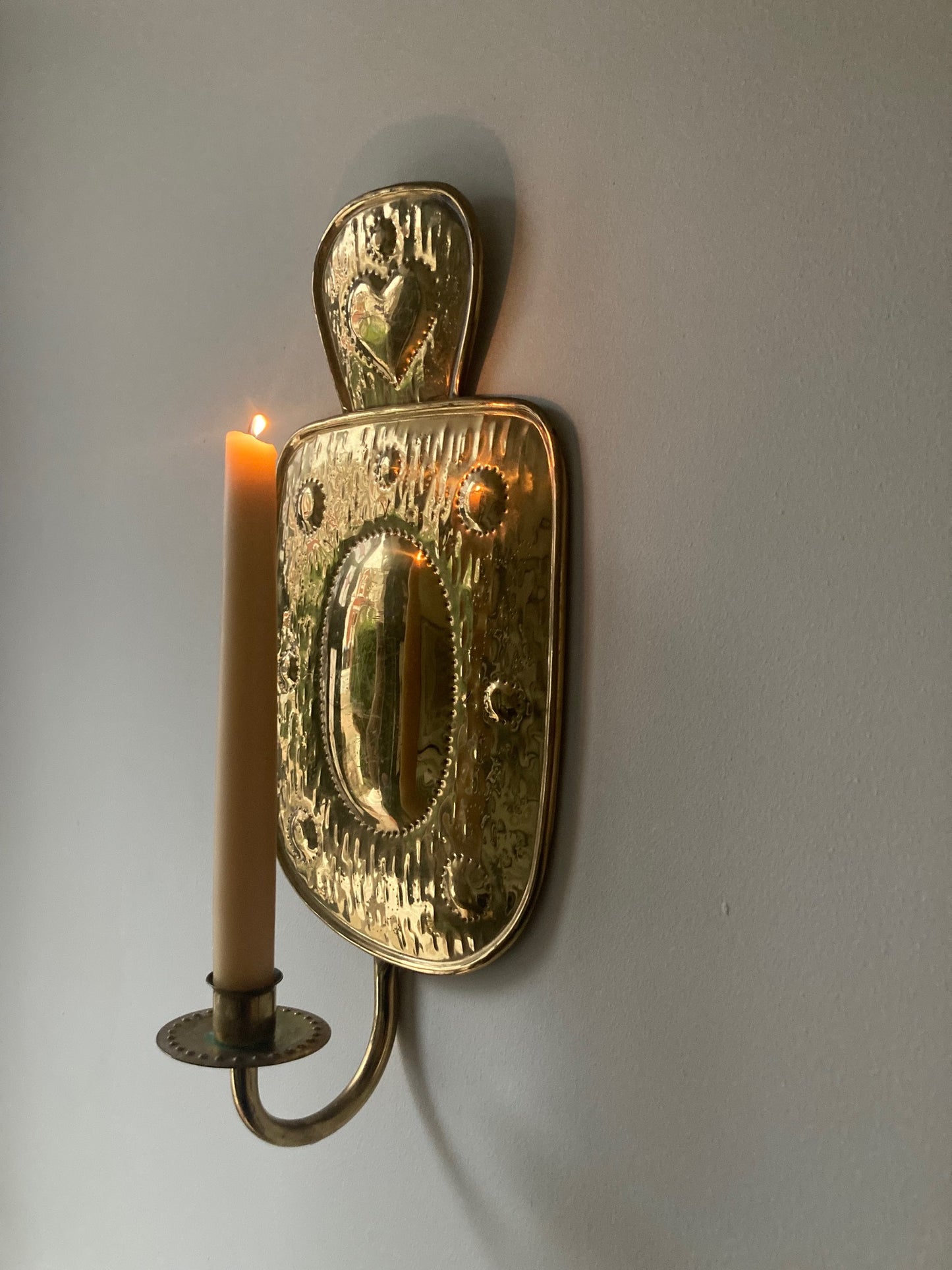 A single Swedish heart sconce