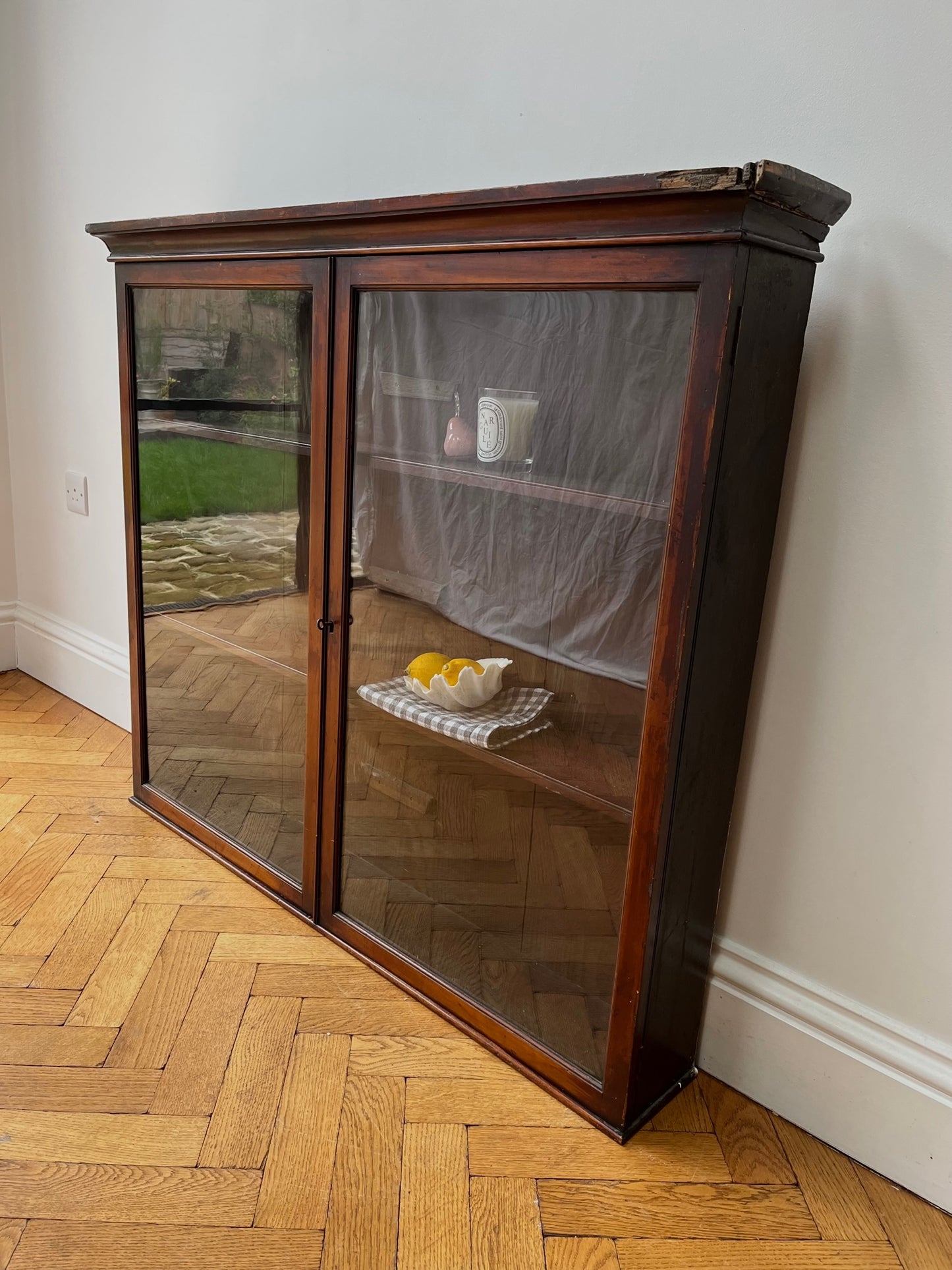 Large glazed wall cabinet