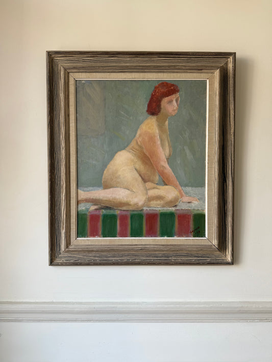 Nude on a striped table