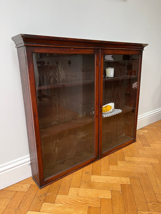 Large glazed wall cabinet