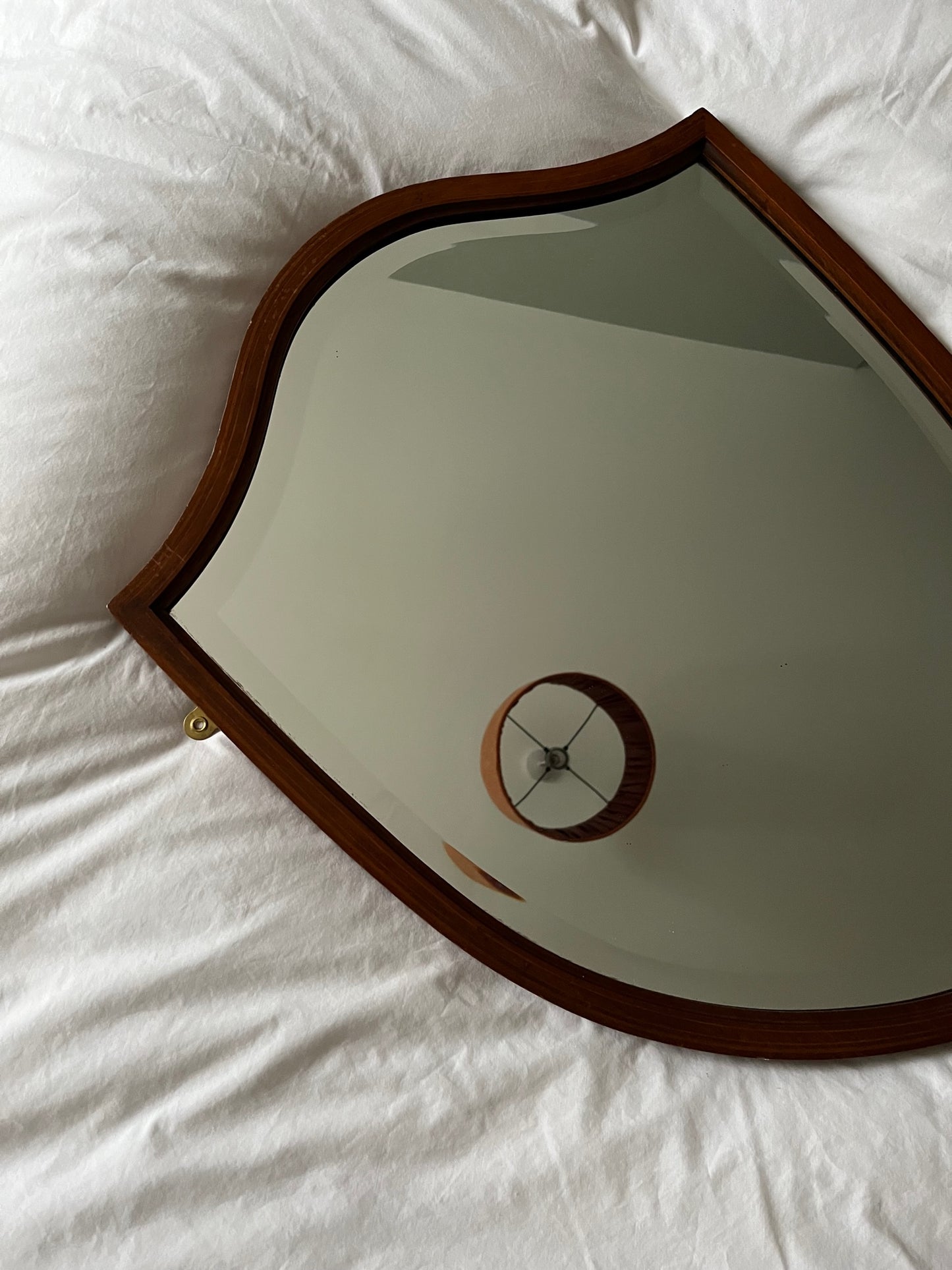 Shield shaped mirror